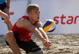 epa08672311 Steven van de Velde of Netherlands in action during the men's first round match with compatriot Christian Varenhorst against Michal Bryl and Mikolaj Miszczuk of Poland at the 2020 CEV Beach Volleyball European Championships in Jurmala, Latvia, 16 September 2020.  EPA/TOMS KALNINS