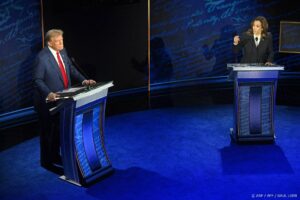 US Vice President and Democratic presidential candidate Kamala Harris speaks as former US President and Republican presidential candidate Donald Trump listens during a presidential debate at the National Constitution Center in Philadelphia, Pennsylvania, on September 10, 2024. 
 
SAUL LOEB / AFP