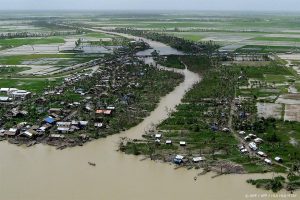 This picture taken from a helecopter on July 29, 2008, shows a general aerial view of an area affected by cyclone Nargis at Bogalay township.   Myanmar's military regime is giving desperately needed aid to cyclone survivors on credit, requiring them to pay back to the government any assistance offered, officials said.   AFP PHOTO/Hla Hla Htay
HLA HLA HTAY / AFP