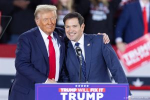 Former US President and Republican presidential candidate Donald Trump greets Senator Marco Rubio, Republican of Florida, during a campaign rally at the J.S. Dorton Arena in Raleigh, North Carolina, on November 4, 2024.  Bitter rivals Kamala Harris and Donald Trump embark on a final frenzied campaign blitz Monday with both hitting must-win Pennsylvania on the last day of a tight and volatile US presidential election campaign.
Ryan M. Kelly / AFP