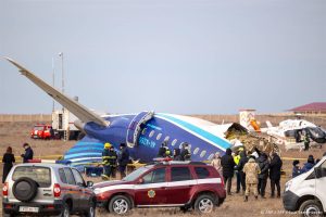 Emergency specialists work at the crash site of an Azerbaijan Airlines passenger jet near the western Kazakh city of Aktau on December 25, 2024. 
Issa Tazhenbayev / AFP